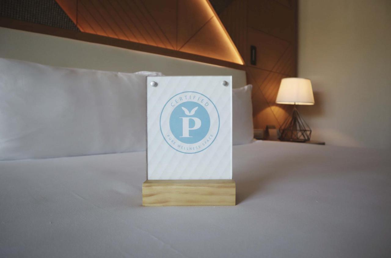 Haven Riviera Cancun (Adults Only) Alfredo V. Bonfil Exterior foto A sign in a hotel room